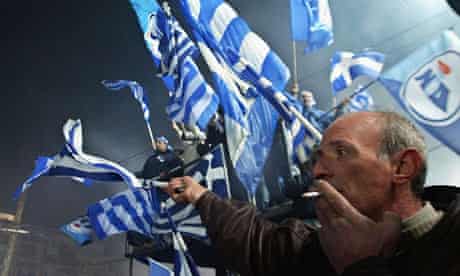 Greek protesters wave flags in Athens 