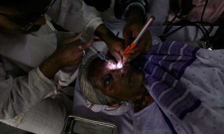 A woman receives treatment at a free eye-care camp in Siliguri