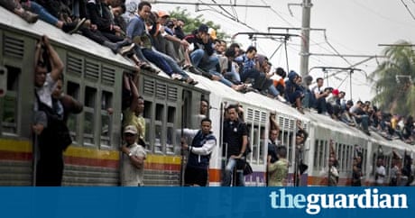Roof justice as Indonesian rail surfers face the brushoff World news The Guardian Roof justice as Indonesian rail surfers face the brushoff World news The Guardian