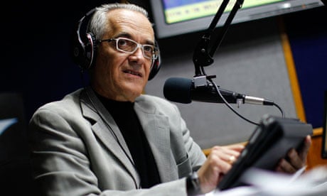 Reporter Bocaranda talks during his radio program in Caracas