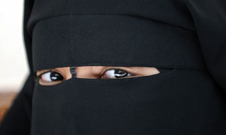 A woman wearing a niqab, or full veil