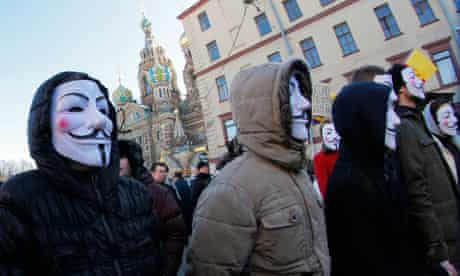 Demonstrators attend a protest against Kremlin policies and vote rigging in St Petersburg