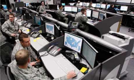 Personnel work at the Air Force Space Command Network Operations in Colorado Springs