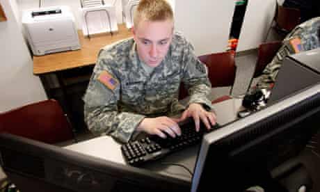 A student from Norwich University Military College in Vermont, US, works on a computer