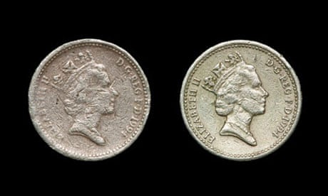 A fake British pound coin (left) alongside a genuine one