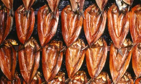 Rows of kippers in a smoking oven.