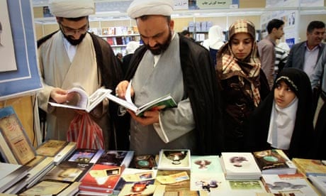 Visitors browse during the Tehran international book fair