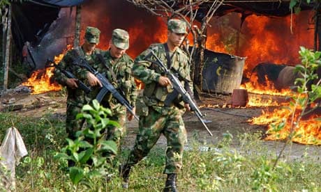 Soldiers torch a cocaine processing laboratory near the city of Cucuta, in northern Colombia.