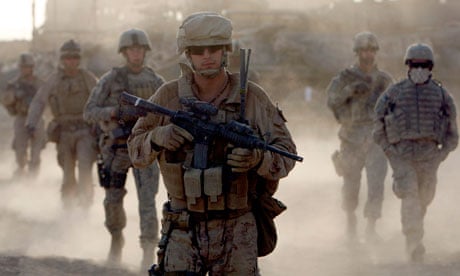 US marines on patrol near the town of Khan Neshin in Helmand, 2009