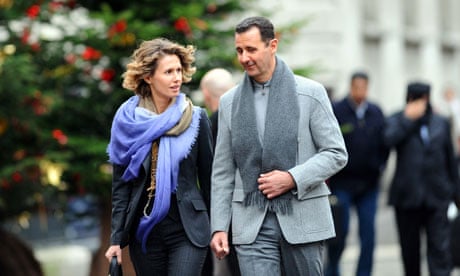 Asma Al-Assad with her husband in Paris in 2010.