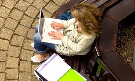 A student works on her laptop