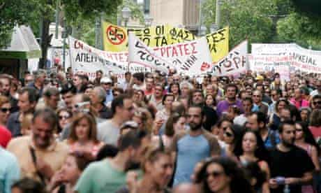 Greeks Protest Planned Pay Cuts