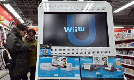 A customers plays with a Nintendo Wii display at a brand new Best Buy  electronics store in Union Square in New York on Saturday, November 14,  2009. Nintendo announced its first quarterly