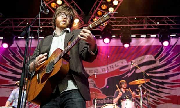 Will Sheff with guitar on stage with Okkervil River
