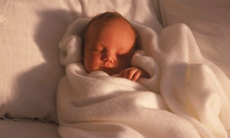 Swaddling babies can cause them hip problems, doctors warn