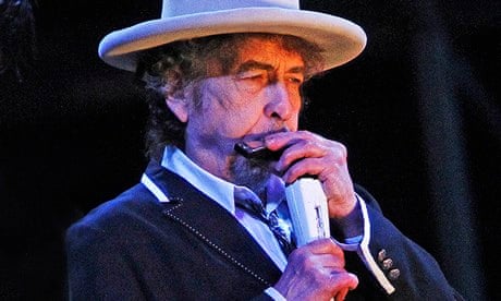 Bob Dylan playing harmonica
