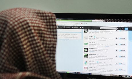 A man browses Twitter on his computer in Riyadh