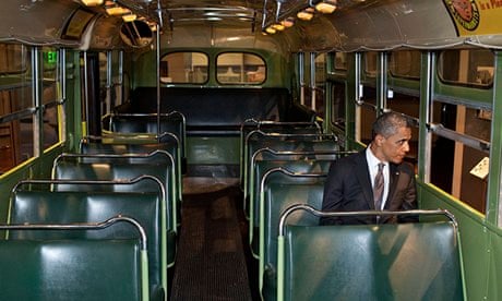 Barack Obama sits on the Rosa Parks bus