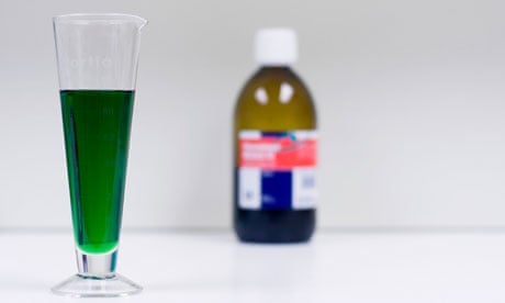 Bottle of methadone and measuring glass. Image shot 2010. Exact date unknown.