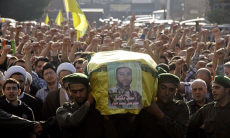 Members of Lebanon's Hezbollah carry coffin