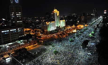 People march in downtown Rio de Janeiro