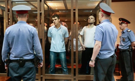 The 'Bolotnaya case' defendants in their glass box at the trial in Moscow.