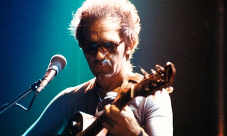 JJ Cale onstage with guitar