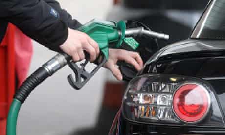 Person using petrol pump