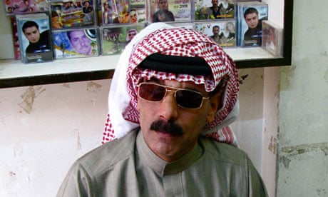 Omar Souleyman in a Syrian music stall.