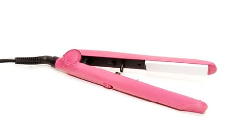 An electric pink hair straightener.
