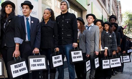 British musicians Miss Dynamite and Charlie Simpson stand in line outside a job centre