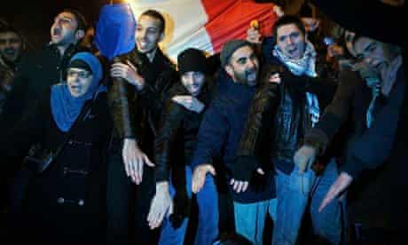 Supporters of the French comedian Dieudonné make the quenelle gesture during a demonstration in Pari