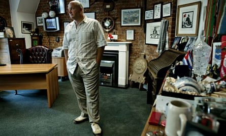 Bob Crow, general secretary of the RMT, standing in his office