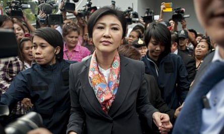 Yingluck Shinawatra meets her supporters on 7 May in Bangkok after being forced to step down