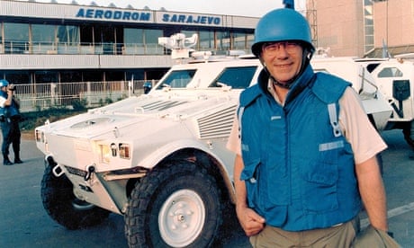 Cedric Thornberry in helmet and flak jacket outside Sarajevo airport