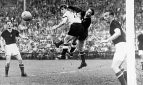 Gyula Grosics and German striker Hans Schäfer tangle during the 1954 World Cup final.