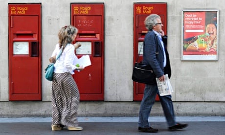 Royal Mail post boxes set into a wall
