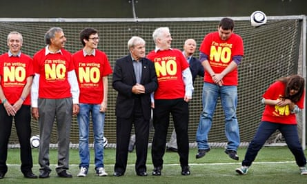 Former Celtic player Bertie Auld, dodges a free kick at a no campaign event.