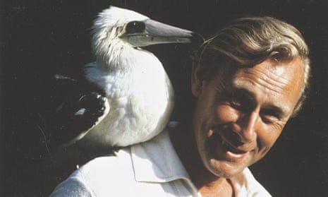 Bryan Nelson with an Abbott's booby, a close relative of the gannet, on his shoulder