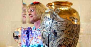 2003 Turner Prize winner Grayson Perry with one of his vases