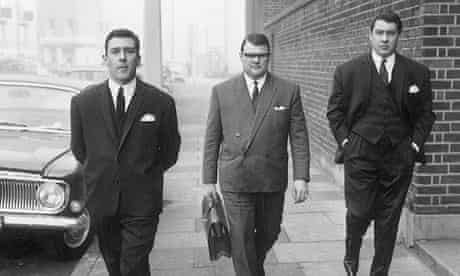 East End gangsters Reggie, left, and Ronnie Kray on their way to court in London in 1965. 