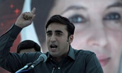 Bilawal Bhutto Zardari at a rally before a poster of his mother, assassinated premier Benazir Bhutto