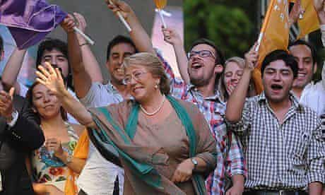 Michelle Bachelet, centre, celebrates with supporters after winning Chile's presidential election