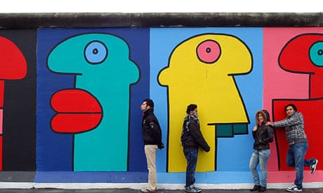 Berlin Wall murals by French artist Thierry Noir who joined protesters fighting to preserve the wall