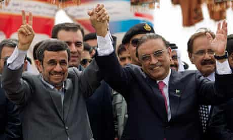 Iran's President Mahmoud Ahmadinejad, left, with Pakistan's Asif Ali Zardari, at the pipeline launch