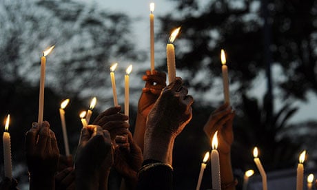Indian activists at a candlelight vigil in Kolkata after cremation of gangrape victim