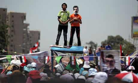 Supporters of Mohammed Morsi protest at Nasr City, Cairo. 