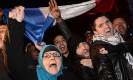 People perform 'quenelle' and Nazi salutes in a protest over a call to ban Dieudonné's new tour