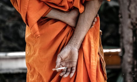 Thai monk smoking