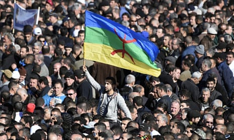 Man waves Amazigh flag
